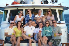 Family picture of guests  on motor vessel Bonaparte forward deck