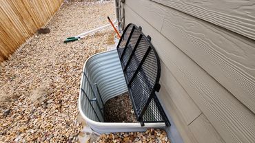 metal grate window well cover with escape hatch