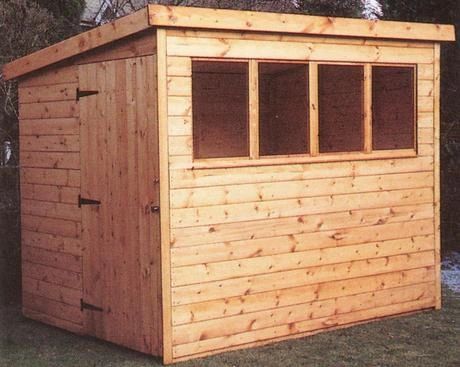 Timber shed with a pent roof