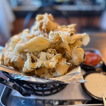 Popular Fried Zucchini appetizer. Thinly sliced. Served since 1991. Our most popular appetizer!