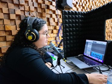 female interpreter in booth