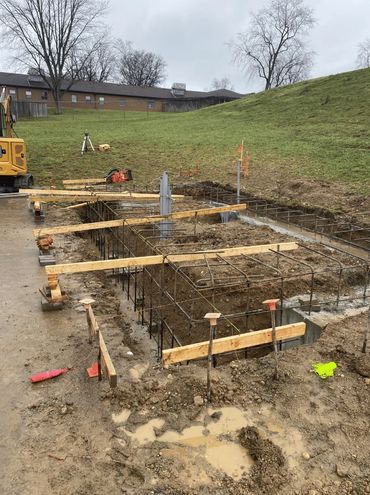 installation of cast-in-place generator pads, expertly self-performed by JTL.