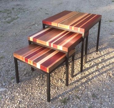 Three nested side tables created with different types of wood.