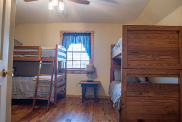 Bunk room with 4 beds