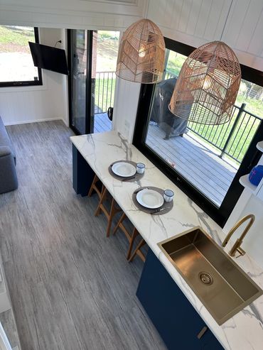 A downward view of the kitchen and living area