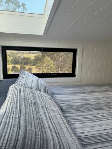 The bedroom with a skylight
