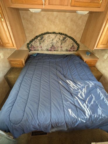 Head up top, feet down low. Enough room to sleep peacefully and snuggle with your partner.