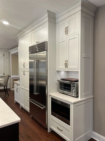 Featuring Sub-Zero appliances wrapped in custom cabinetry. This was the perfect area to house a draw