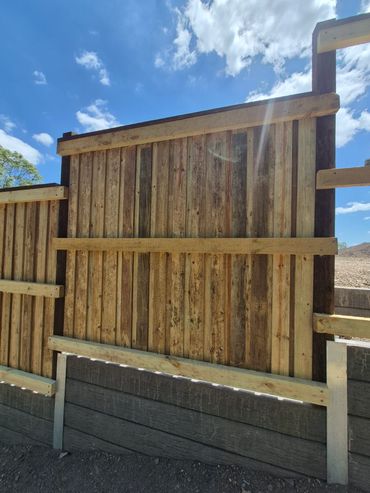 Hardwood posts and hardwood rail lapped and capped timber fence 1.8m