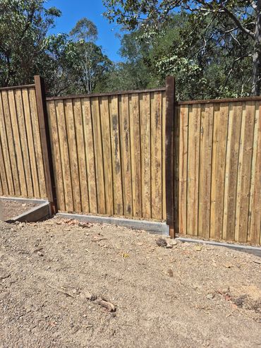 Hardwood posts and hardwood rail lapped and capped timber fence 1.8m