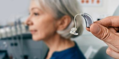 Behind the ear (BTE) with ear mould hearing aids.
