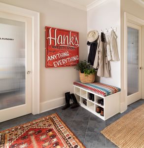 Built-in benches encourage leaving shoes by the door rather than tracking pollutants into the home.