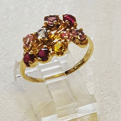 ring with red gemstones