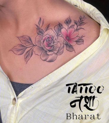 In this exquisite creation by Tattoo Nasha, a delicate and elegant floral tattoo blooms with beauty