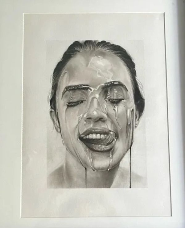 A black and white portrait of a smiling woman with dripping paint effect.
