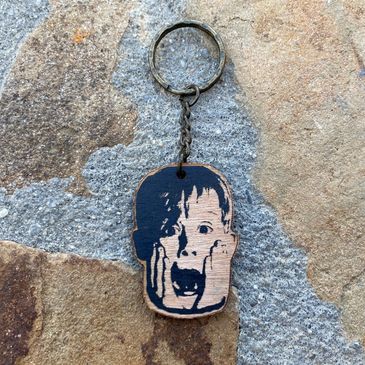 Wooden Macaulay Culkin keychain.