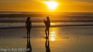 Images Taken By Rich AMeN Gill of Colorful Beach Sunsets against Various California Piers....