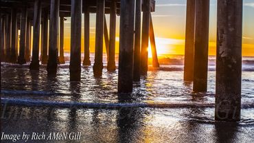 Images Taken By Rich AMeN Gill of Colorful Beach Sunsets against Various California Piers....