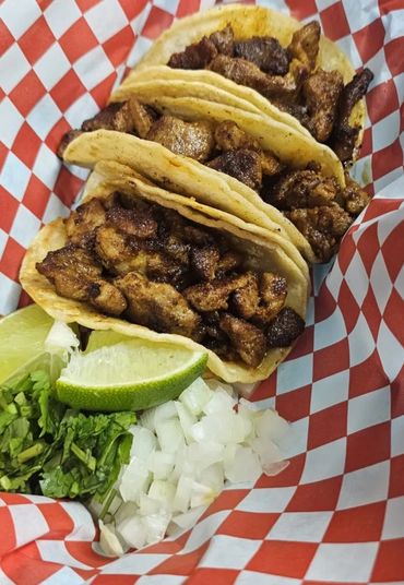 A close up of tacos on the table