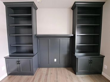 Guest bedroom built-ins with adjustable shelving and night stand storage