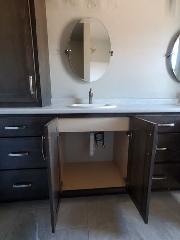 Standard base sink cabinet opening with built-in apron to hide sink