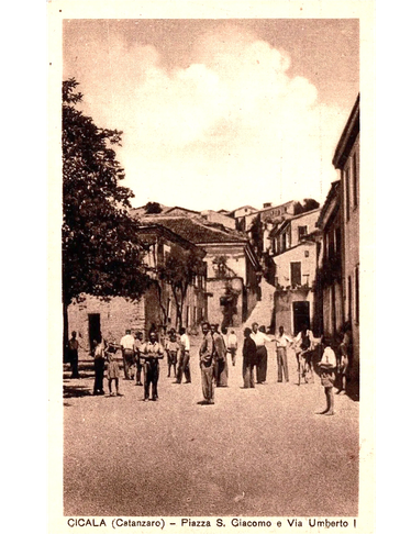 People gathered in a historic town square in Cicala, Catanzaro.