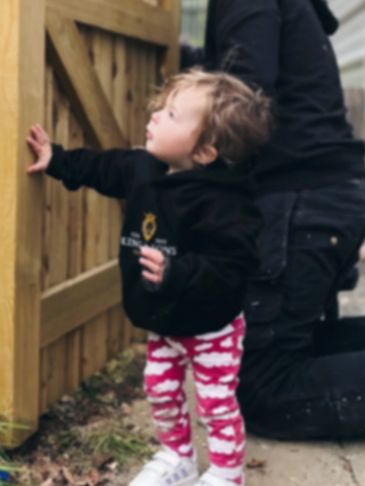 Child wearing King & Sons jumper