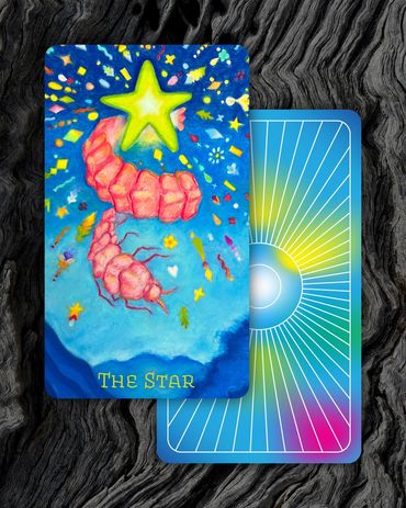 Front and back of The Star: a pink larval-looking insect with a bright green star near its tail.