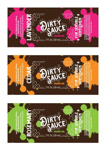 Three labels laid out flat. Lavender has pink splats, cedar has orange, and rosemary has green.