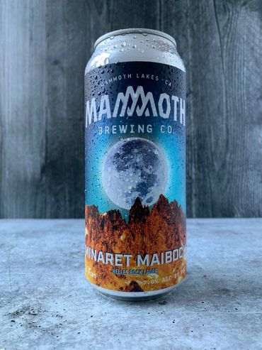 Condensation-covered Minaret Maibock can showing large full moon behind Minaret peaks.