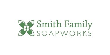 Logo with olive blossom on the left and "Smith Family Soapworks" text on the right