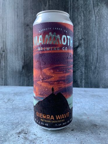 Sierra Wave can with dramatic sunset and small human silhouette.