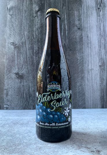 Elderberry Sour label with brush script beer name, elderberries and elder flowers.