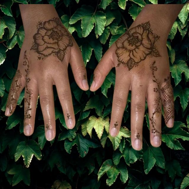 Hands with tattoos
