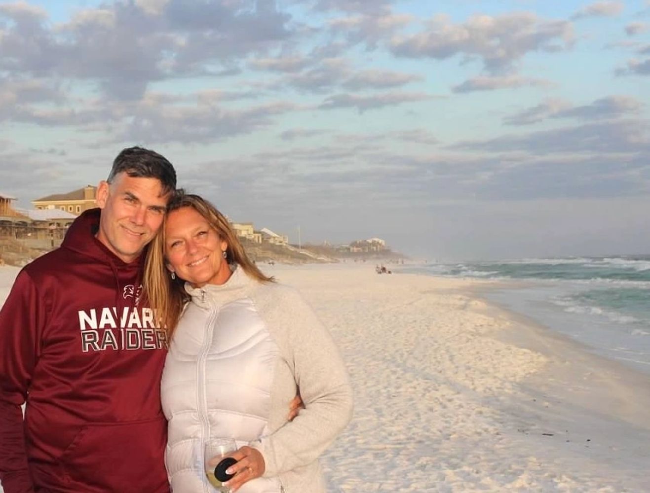 couple standing on the beach in destin