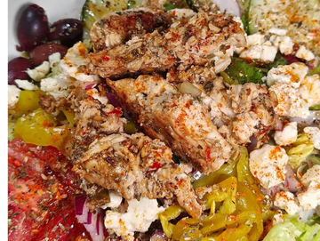 Classic Greek Salad, Grilled marinated chicken, on romaine lettuce tomatoes, banana peppers, feta ch