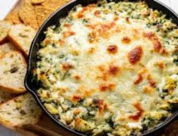 REAL Jumbo Lump Crab meat folded into fresh grated Parmesean Cheese, artichole, and baby spinach. An