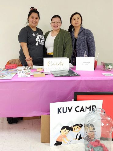 Our volunteers Kalia and Lisa with our partner Elizabeth.