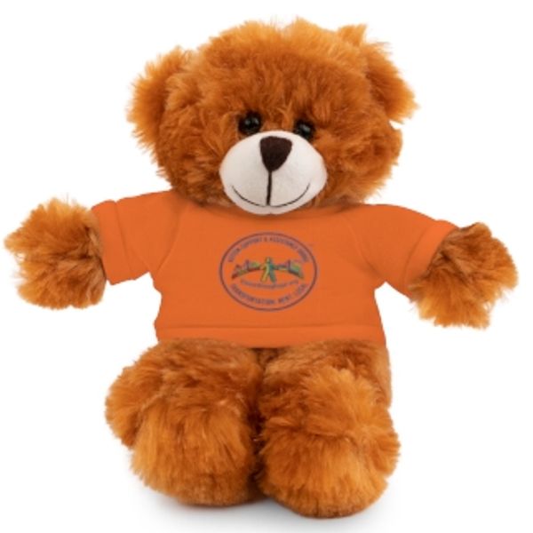Fluffy brown teddy bear wearing an orange T-shirt with a logo.