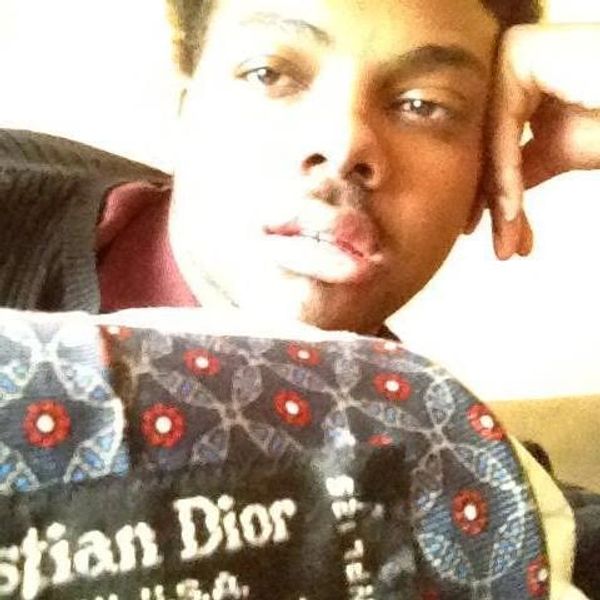 A young, The Real Adonis modeling a vintage Christian Dior mens tie collection, for theealadonis.com