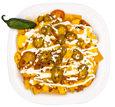 Fotografia de nachos con queso y crema