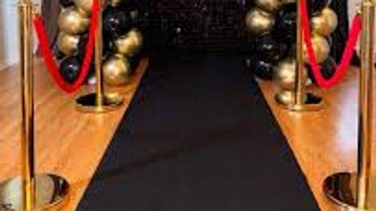 Black carpet Rental with gold stanchions