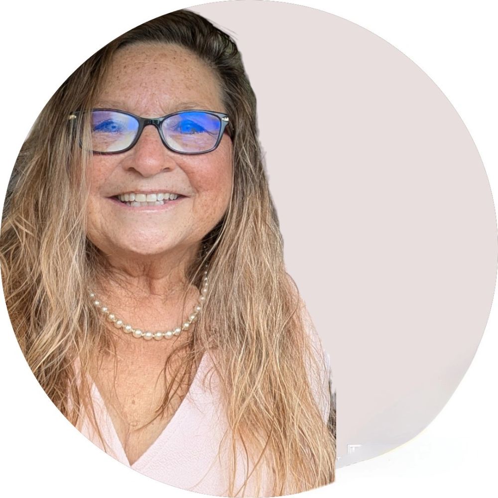 René Spires, holistic health coach and wellness educator, smiling in a natural portrait