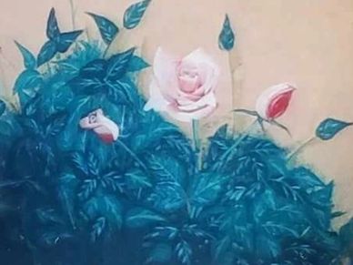 A mural of pink roses blooming among blue leaves on a beige wall.