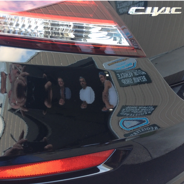 Reflection in high-gloss paint finish on Honda Civic