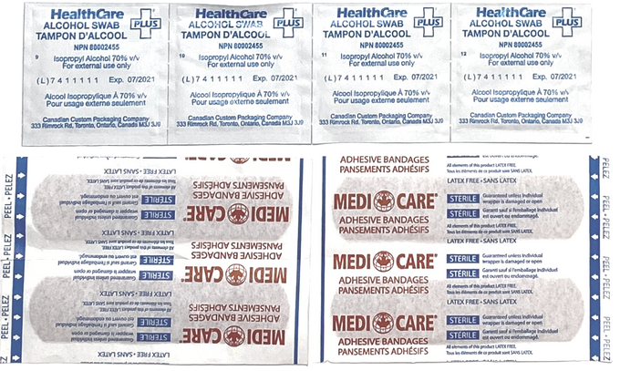 Medical supplies, Fabric bandages and alcohol wipes to help treat a tick bite.