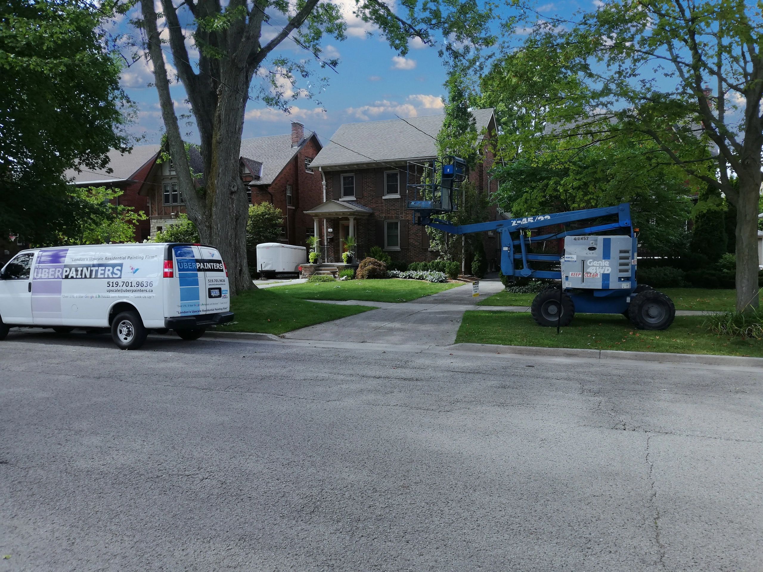 UBERPAINTERS vans in Old North London, Ontario
