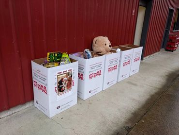 Toys for Tots football donation bins