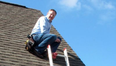 David inspecting roof