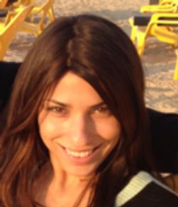 Front angle view of a girl smiling at the camera